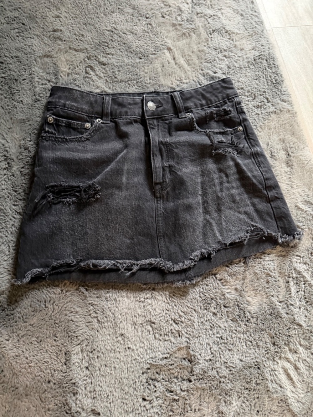 Black ripped jean skirt